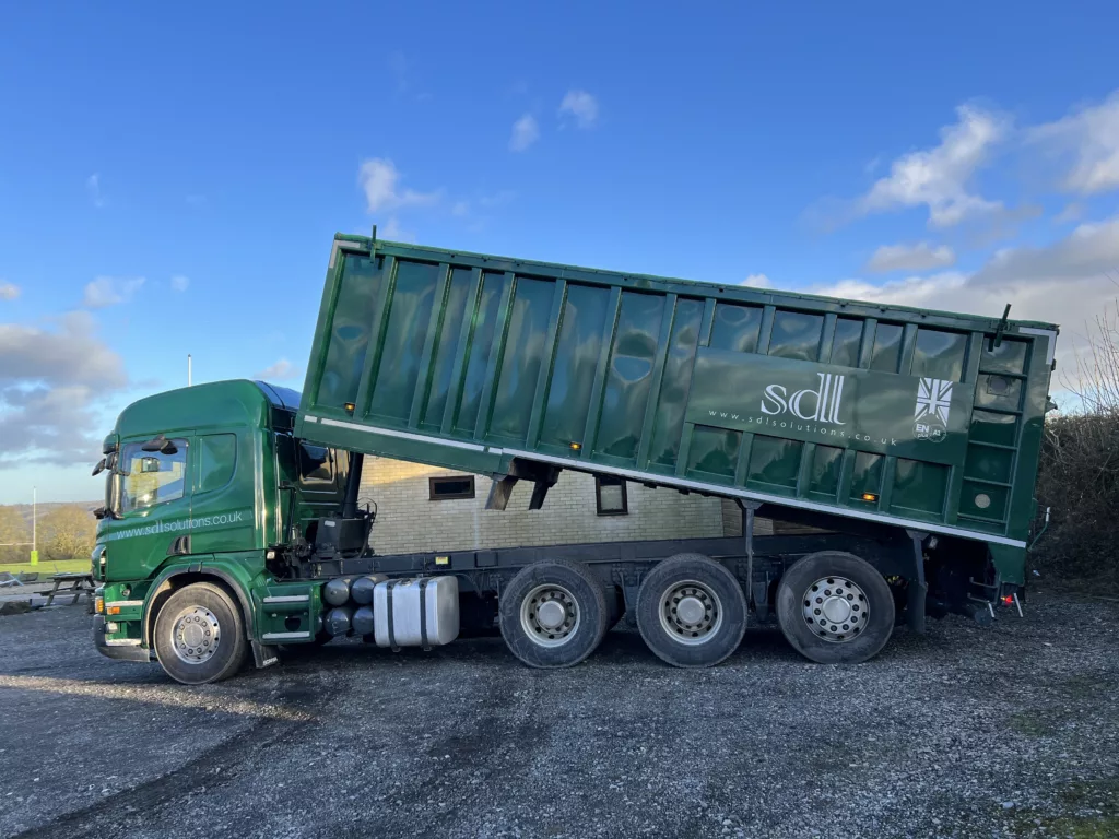 Sustainable Wood Pellets being delivered loose from a blown delivery lorry.